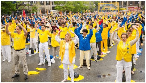 Falun Dafa practitioners exercising during a celebration of World Falun Dafa Day in New York City