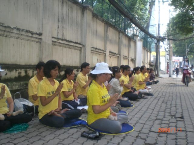 Falun Gong practitioners holding a sit-in in front of the Chinese consulate in Hanoi on October 6. Soon after this photo was taken, Vietnamese authorities forcibly detained over 30 of the participants.