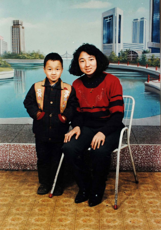 A photo of Ms. Yuan Pingjun with her son several years prior to her arrest. Ms. Yuan was abducted by Chinese security agents on August 2, 2010 taken to a brainwashing center. Nine days later her family was notified that she had died