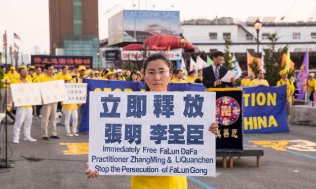 Zhang Hongyu at a rally to raise awareness about the arrest of her father in China, near the Chinese consulate in Manhattan, New York City, on July 16, 2018. (Larry Dye/The Epoch Times)