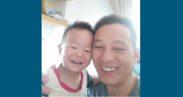 Mr. Dai Xuebing and his son (undated photo)
