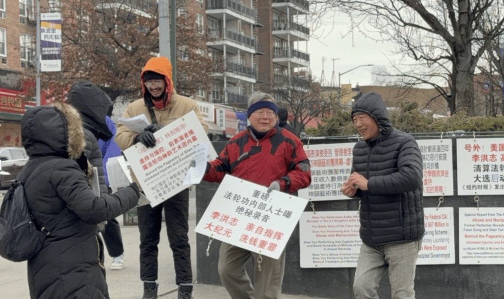 Michael Chu in Flushing on February 2, 2025 displaying anti-Falun Gong banners and distributing materials based on the New York Times negative coverage of Shen Yun.