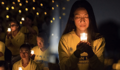 Falun Gong practitioners at the annual candlelight vigil in Washington, D.C. on the anniversary of the persecution in 2017 honoring fellow believers in China who have died during the persecution.