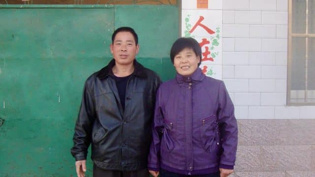Mr. Ding Yuande (left) and Mrs. Ma Ruimei (right), parents of Berlin resident, pictured before their detention on May 12, 2023.