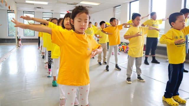 Participants at the 2022 Minghui Summer Camp in Toronto do daily group exercises. (Source: Minghui)
