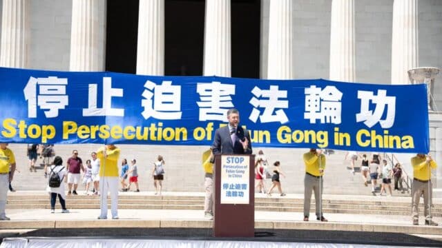 Rep. Pat Ryan speaks at an annual rally calling for the end of the Chinese Communist Party’s ongoing persecution of Falun Gong in China, in front of the Lincoln Memorial in Washington on July 23, 2026. (Dai Bin/Epoch Times)